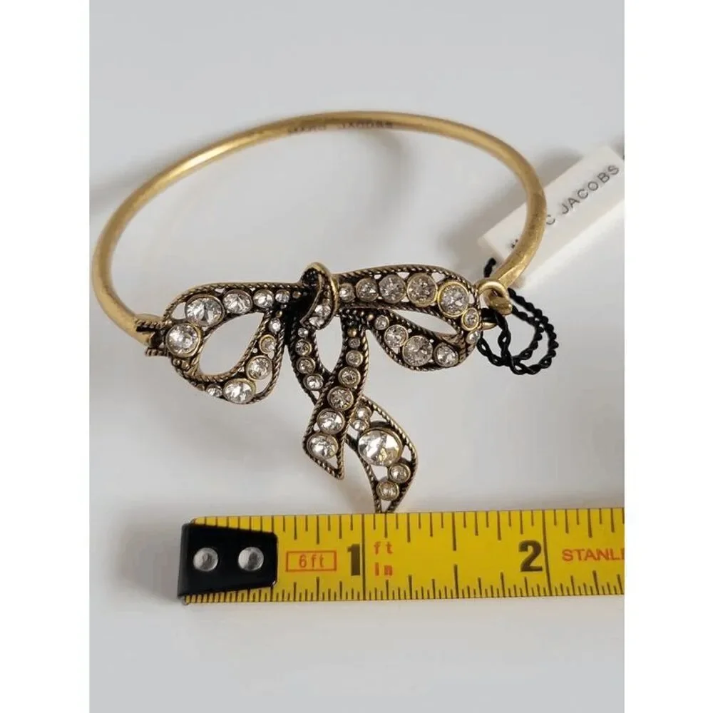 MARC JACOBS Swarovski Crystal Dazzling Bow Gold Hinged Bangle Bracelet NWT